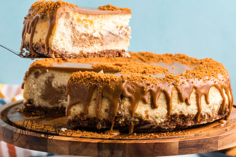 Cheesecake marbled with Biscoff spread baked in a biscoff cookie crust and topped with melted Biscoff spread and crumbled biscoff cookies